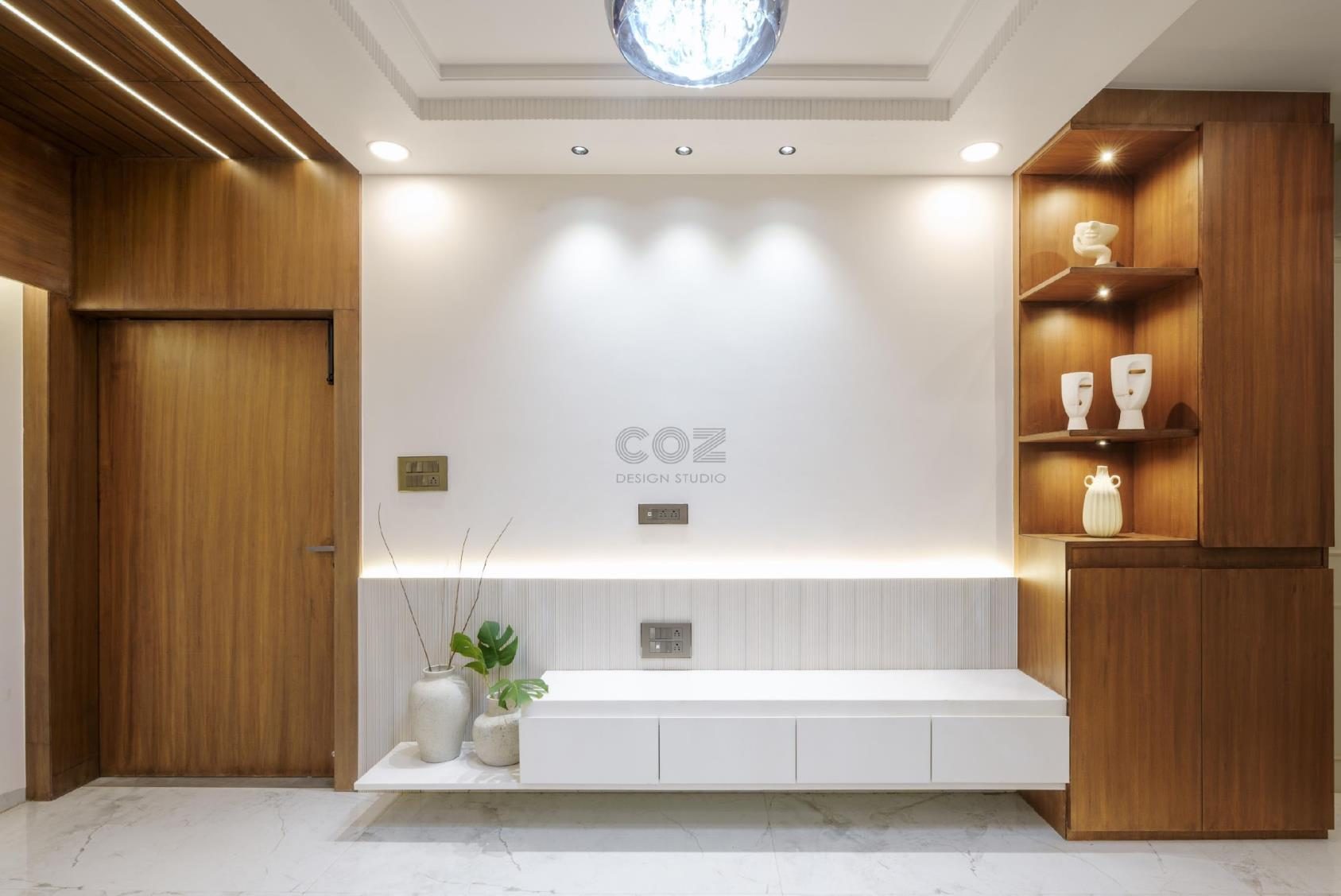 Chaurasia's Residence — Walnut and white living